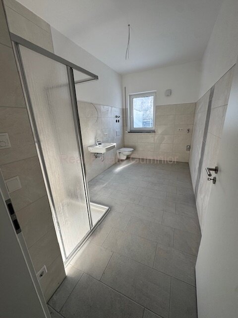 2 Zimmer mit Gartenanteil ** Erstbezug ** Hoher Wohnkomfort -- wenig Nebenkosten ** Balkon ** Top Ausstattung